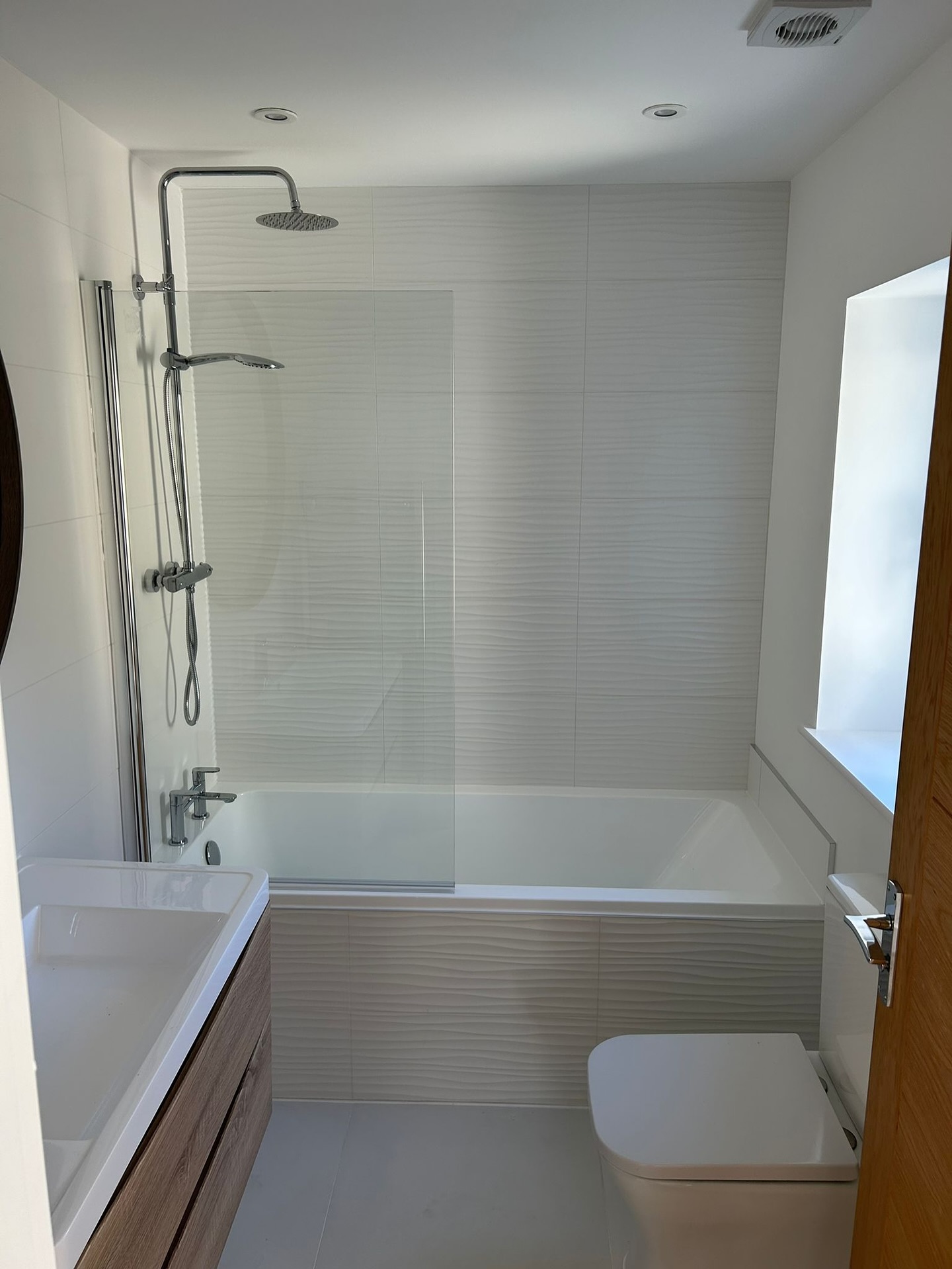 Full bathroom refurbishment with precise tiling work